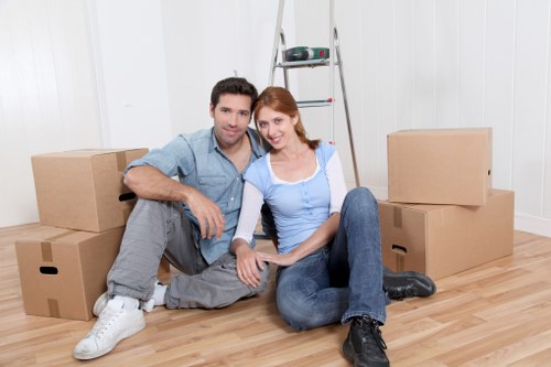 A moving van handling residential access and parking in Colliers Wood