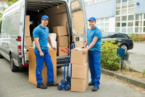 Man and van operator assessing service concerns