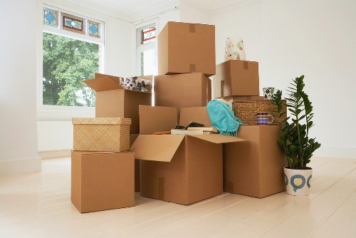 Charity donation boxes and reusable items from a home move