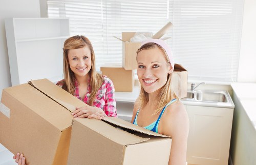 Professional moving service handling boxes and furniture in Collierswood