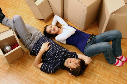 Crew using careful lifting techniques during a move